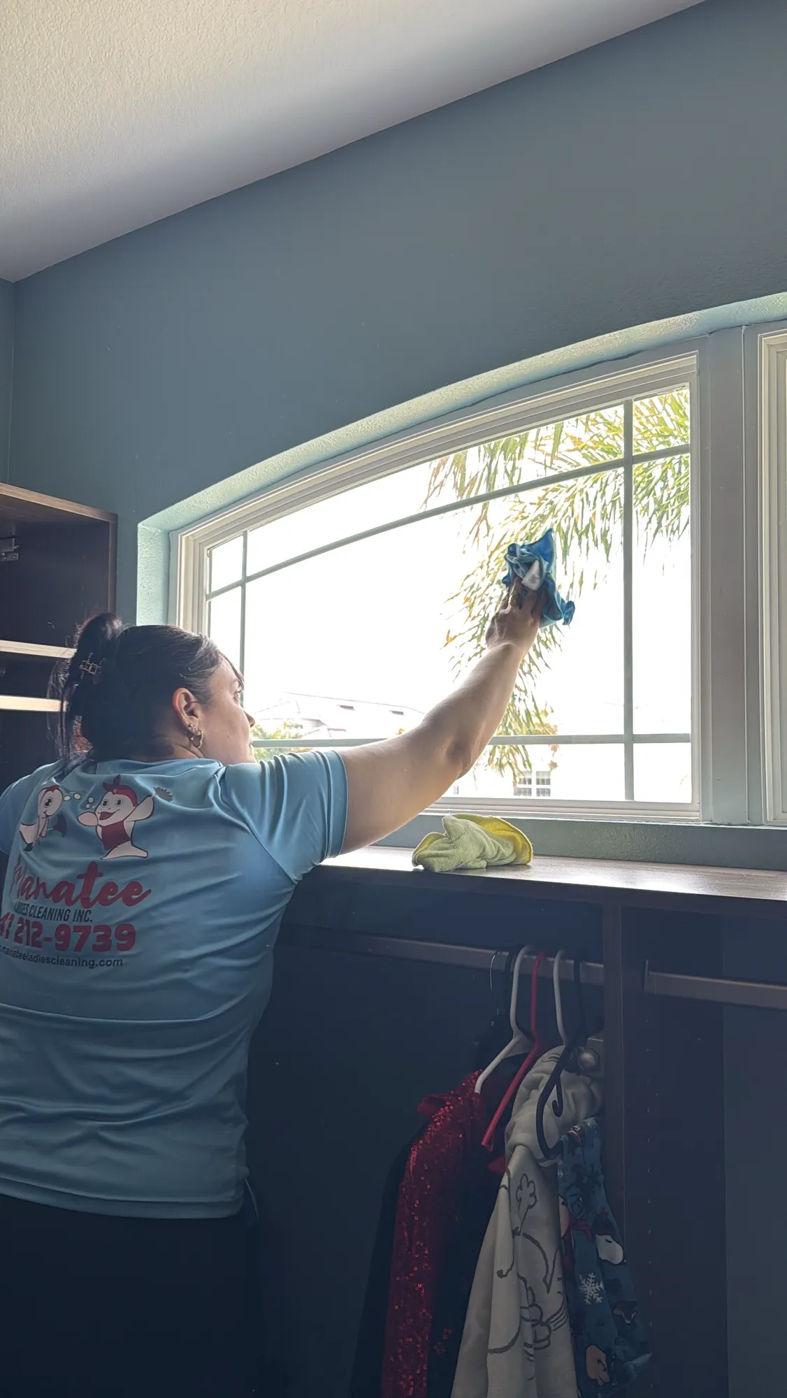 Manatee Ladies professional cleaning team in branded uniforms at work in a Bradenton FL home